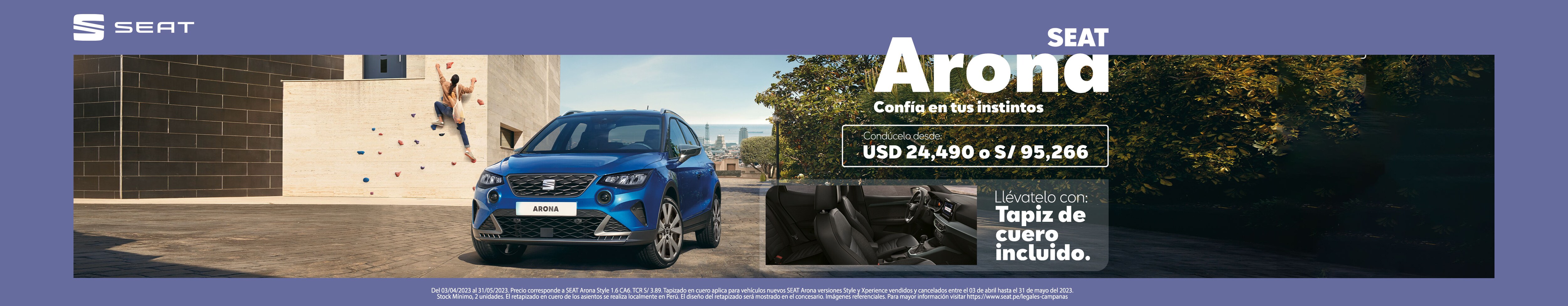 desire red SEAT Arona outdoor side angle view