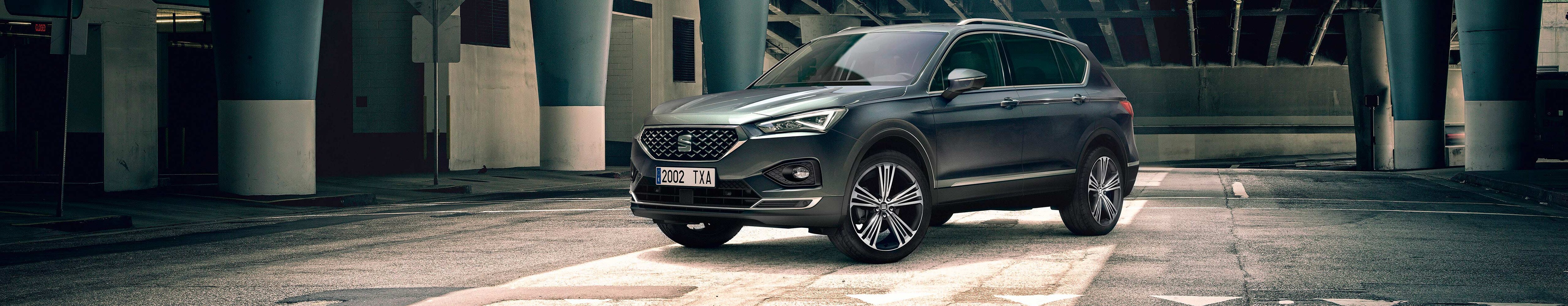 SEAT Tarraco SUV 7 seater parked outside building beauty shot